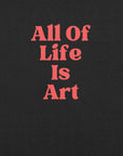 Close-up of black heather Milk Sandwich T-shirt with bold red text that reads All Of Life Is Art, graphic slogan design in retro font.