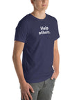 Angled view of man wearing heather midnight navy Milk Sandwich T-shirt with distressed white Help others slogan, clean and modern unisex graphic tee.