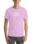 Front view of man wearing lilac Milk Sandwich T-shirt with faded white text that reads Help others. clean, minimalist message tee for everyday wear.