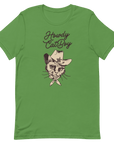 Flat lay of green Milk Sandwich T-shirt featuring Howdy CatBoy text and a vintage-style cowboy cat graphic with hat and bandana on white background