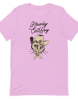 Flat lay of pink Milk Sandwich T-shirt featuring Howdy CatBoy text and a vintage-style cowboy cat graphic with hat and bandana on white background