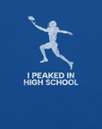 Close-up of true royal Milk Sandwich T-shirt with distressed white football player graphic and text I Peaked in High School, ironic athletic nostalgia tee.