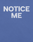 Close-up of a true royal blue Milk Sandwich t-shirt featuring bold white distressed text that reads NOTICE ME in all caps.