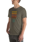 Angled side view of a person wearing a army Milk Sandwich t-shirt with a colorful "Round Earth Society" graphic design.