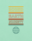 Close-up of a Milk Sandwich mint t-shirt featuring a colorful retro-style graphic with the words ROUND EARTH SOCIETY in yellow, orange, and red stripes above a teal globe icon.