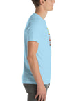 Side profile of a person wearing a ocean blue Milk Sandwich t-shirt featuring a vertical "Round Earth Society" graphic design on the front.