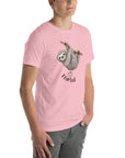 Side view of a man wearing a pink Milk Sandwich t-shirt featuring a playful cartoon sloth hanging from a branch with the phrase I farted and a small puff cloud illustration underneath.