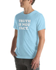 Unisex light blue Milk Sandwich T-shirt with the phrase "Truth is Not Fact" displayed prominently on the front.