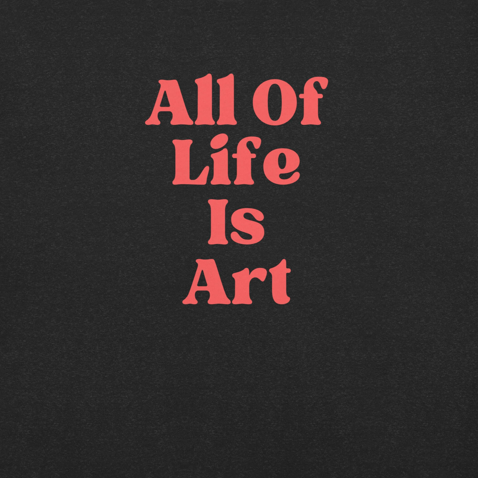 Close-up of  black heather Milk Sandwich T-shirt with bold red text that reads All Of Life Is Art, graphic slogan design in retro font.
