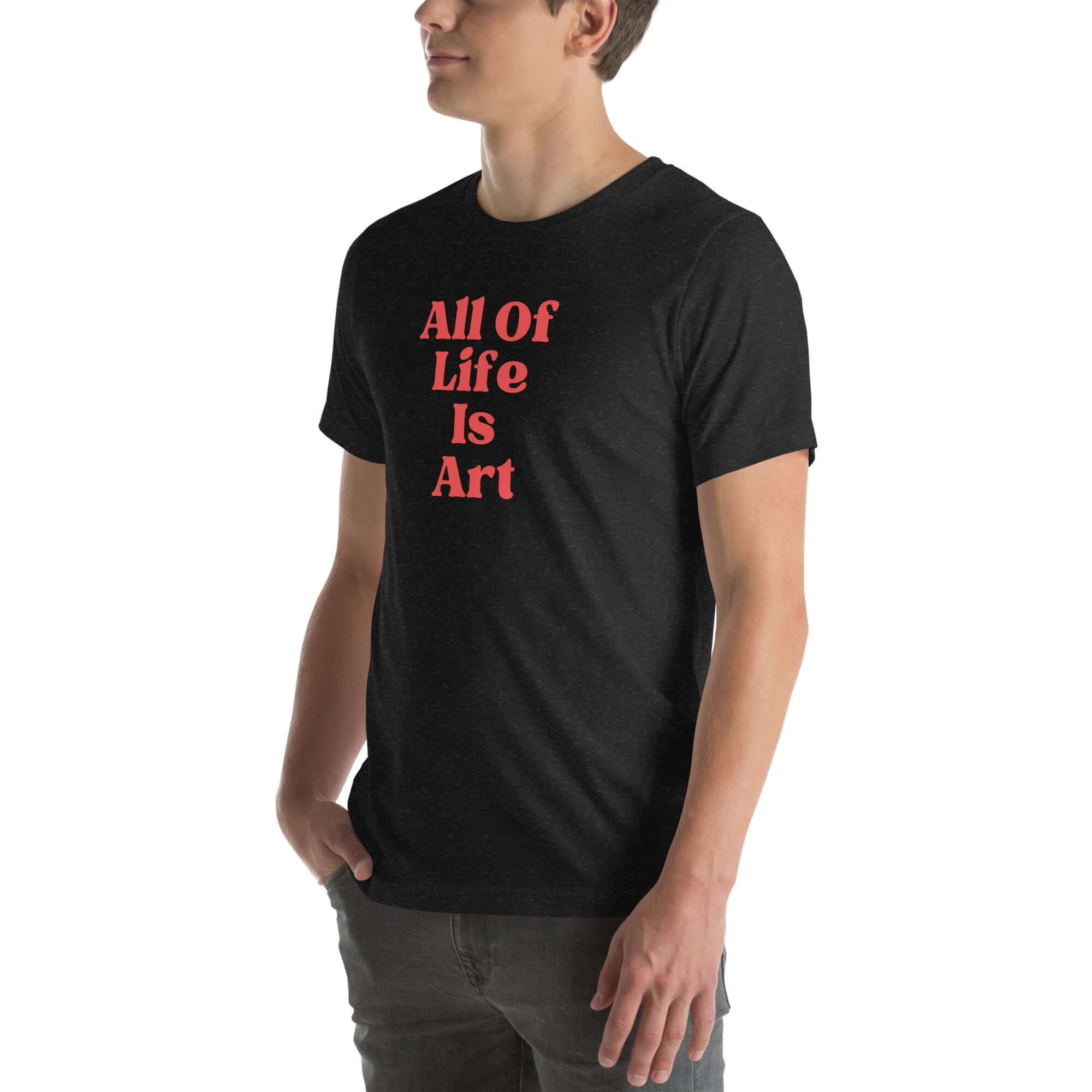 Side view of man wearing  black heather Milk Sandwich T-shirt with red All Of Life Is Art text, casual graphic tee with vintage-style typography.