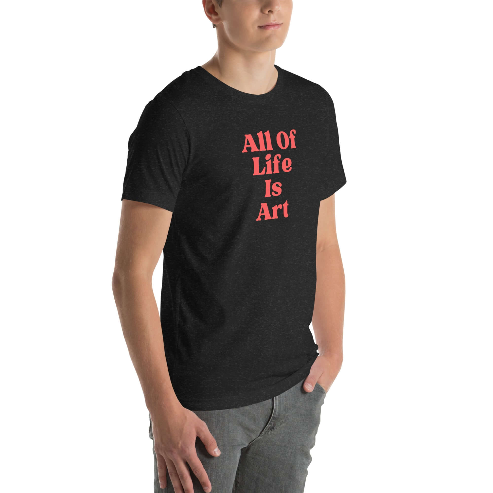 Angled view of man wearing  black heather Milk Sandwich T-shirt with bold red All Of Life Is Art text, modern unisex graphic tee with vintage font.