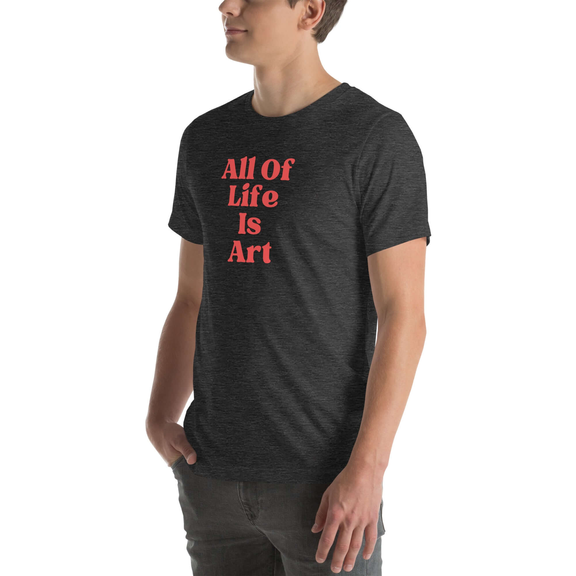 Side view of man wearing dark grey heather Milk Sandwich T-shirt with red All Of Life Is Art text, casual graphic tee with vintage-style typography.