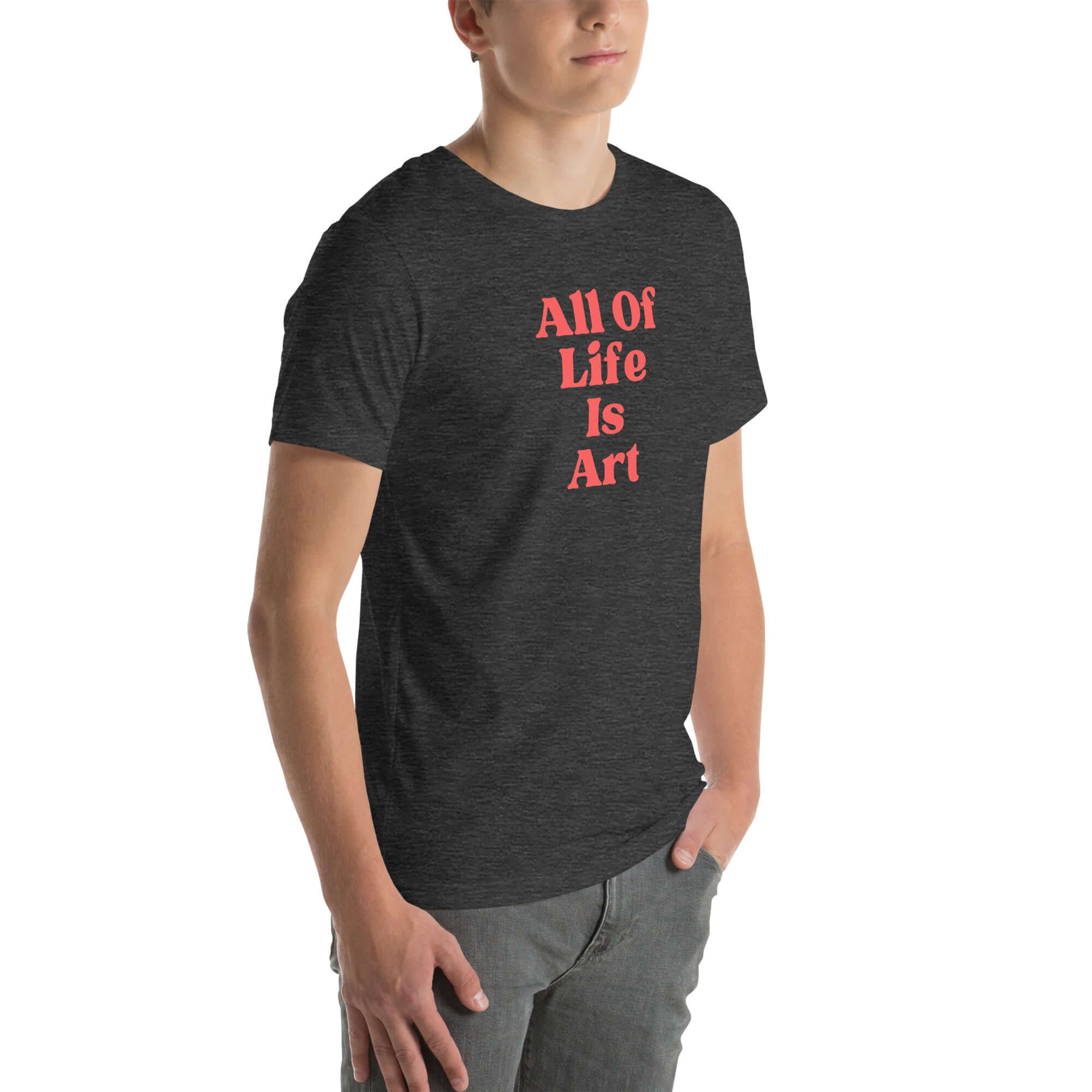 Angled view of man wearing dark grey heather Milk Sandwich T-shirt with bold red All Of Life Is Art text, modern unisex graphic tee with vintage font.