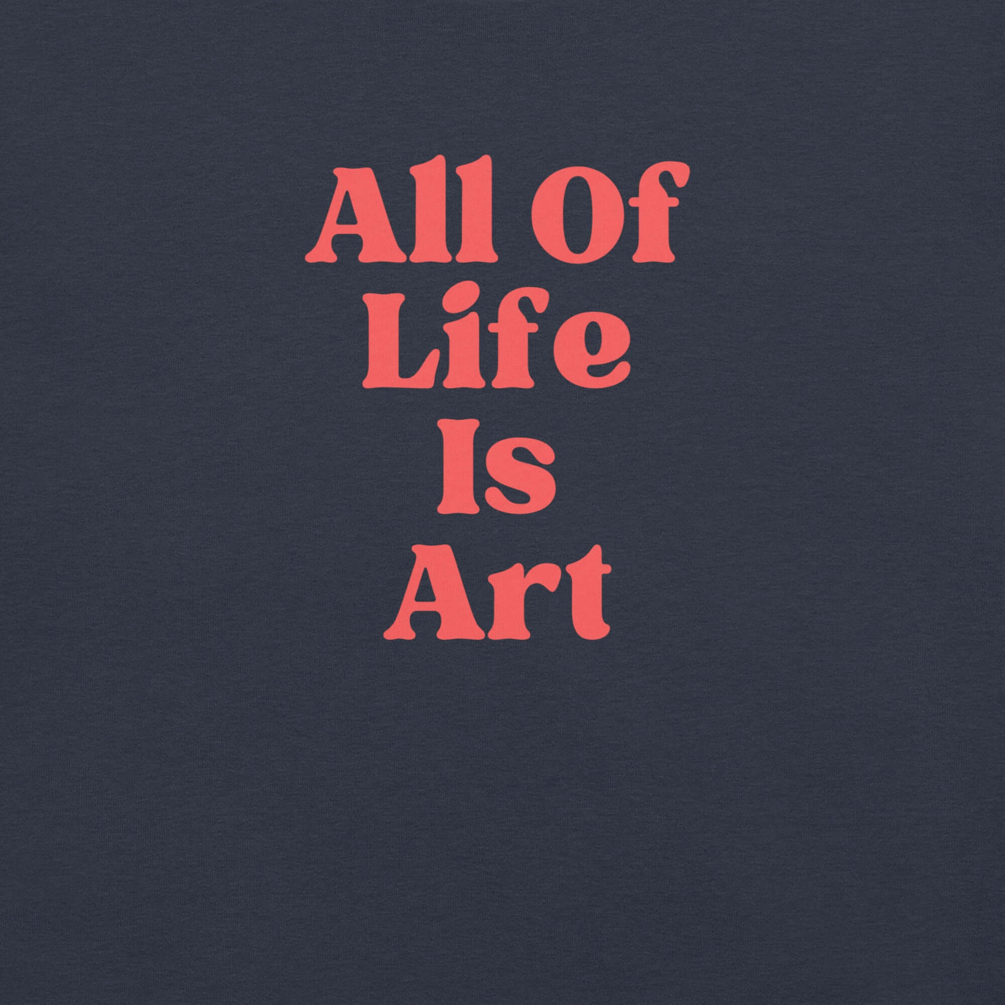 Close-up of heather navy Milk Sandwich T-shirt with bold red text that reads All Of Life Is Art, graphic slogan design in retro font.
