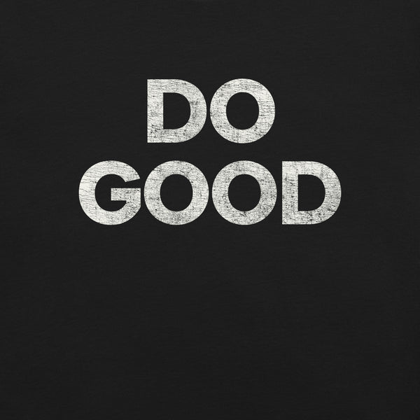 Close-up of black Milk Sandwich T-shirt with bold distressed white text that reads DO GOOD, minimalist motivational graphic tee.