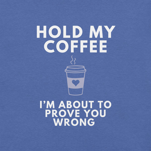 Close-up of true royal blue Milk Sandwich T-shirt with white bold text Hold My Coffee, I'm About to Prove You Wrong and a cute steaming coffee cup graphic.
