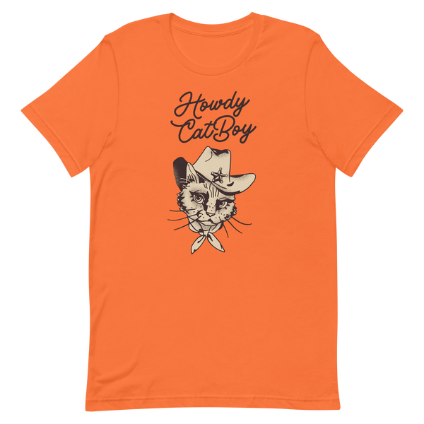 Flat lay of orange Milk Sandwich T-shirt featuring Howdy CatBoy text and a vintage-style cowboy cat graphic with hat and bandana on white background