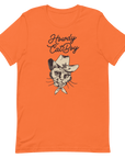 Flat lay of orange Milk Sandwich T-shirt featuring Howdy CatBoy text and a vintage-style cowboy cat graphic with hat and bandana on white background