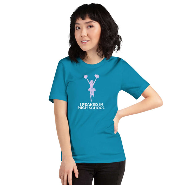 Unisex aqua Milk Sandwich T-shirt with "I Peaked in High School" design, perfect blend of comfort and style for any casual occasion.