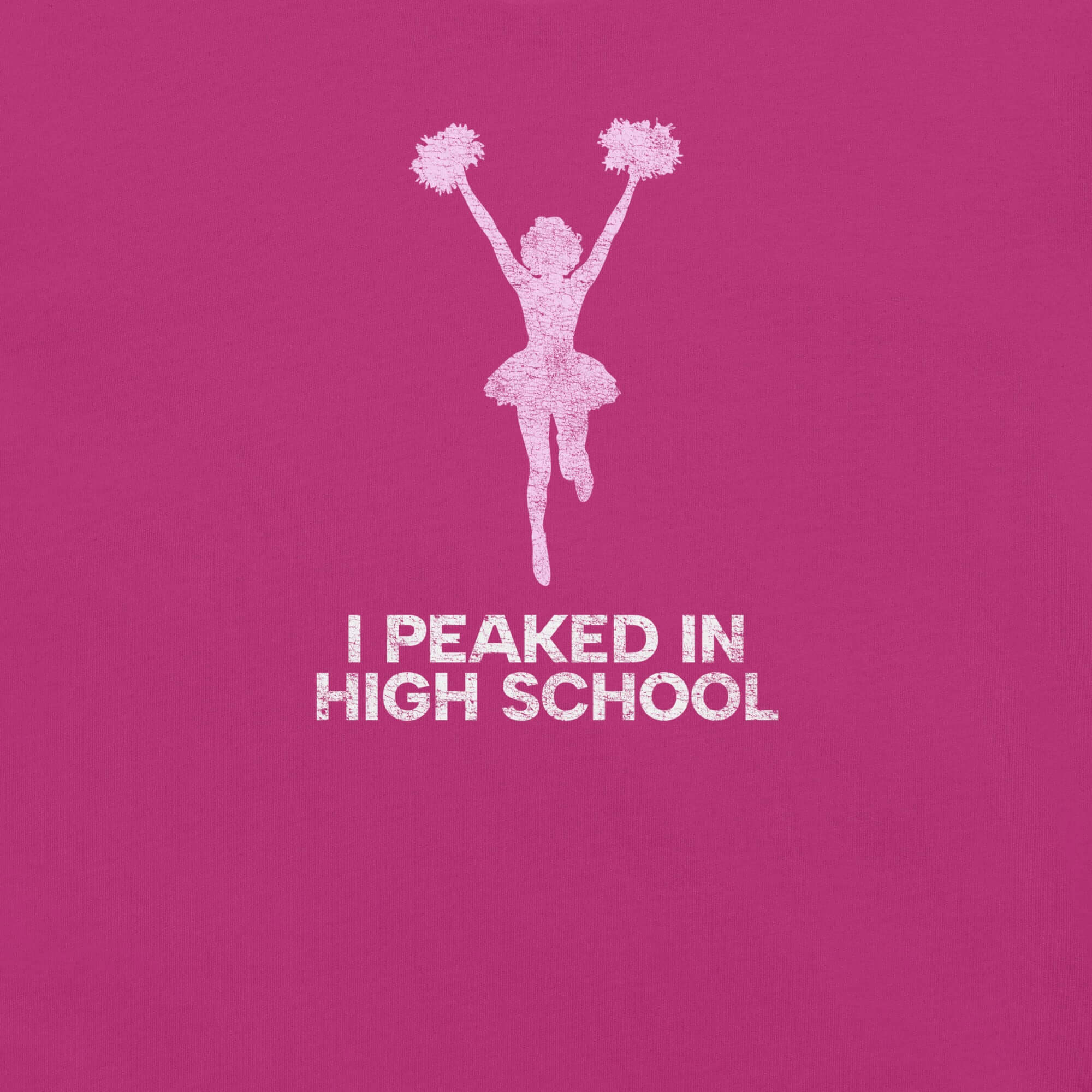 Close-up of berry Milk Sandwich T-shirt with distressed pink cheerleader graphic and white text that reads I Peaked in High School, sarcastic retro tee.