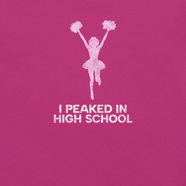 Close-up of berry Milk Sandwich T-shirt with distressed pink cheerleader graphic and white text that reads I Peaked in High School, sarcastic retro tee.