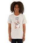 Woman wearing a playful "I'm High, Can I Pet Your Dog?" Milk Sandwich T-shirt with a cute corgi design, perfect for dog lovers.