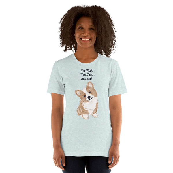 Woman wearing a light blue Milk Sandwich T-shirt with "I'm High, Can I pet your dog?" text and a cute corgi illustration.