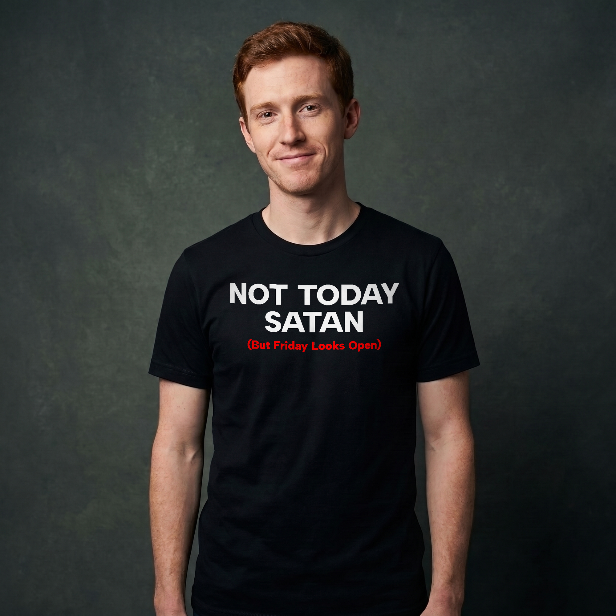 Man wearing black Milk Sandwich unisex T-shirt with bold white and red text reading Not Today Satan (But Friday Looks Open), funny slogan tee in studio portrait.