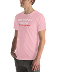 Side view of man wearing pink Milk Sandwich T-shirt with Not Today Satan (But Friday Looks Open) in bold white and red text, humorous graphic tee.