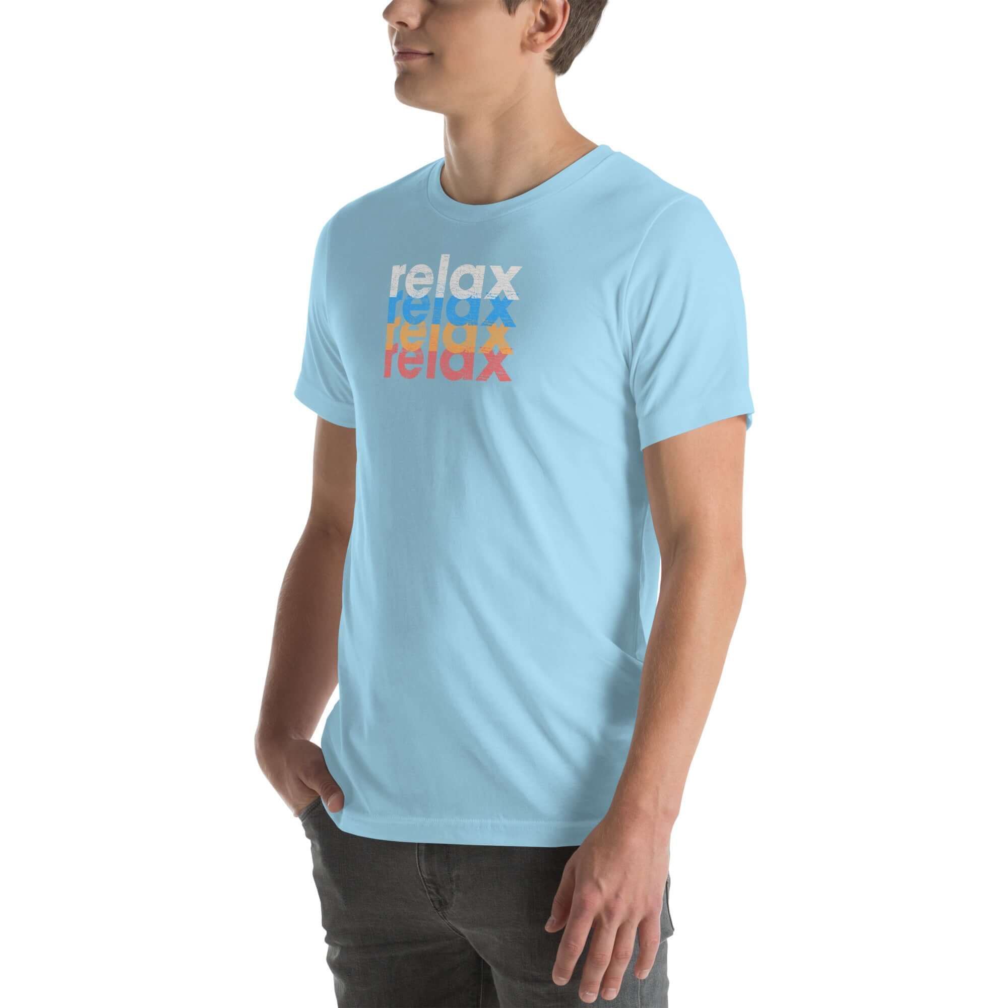 Side view of a man wearing a Milk Sandwich ocean blue t-shirt featuring a stacked relax text design in distressed white, blue, orange, and pink colors.
