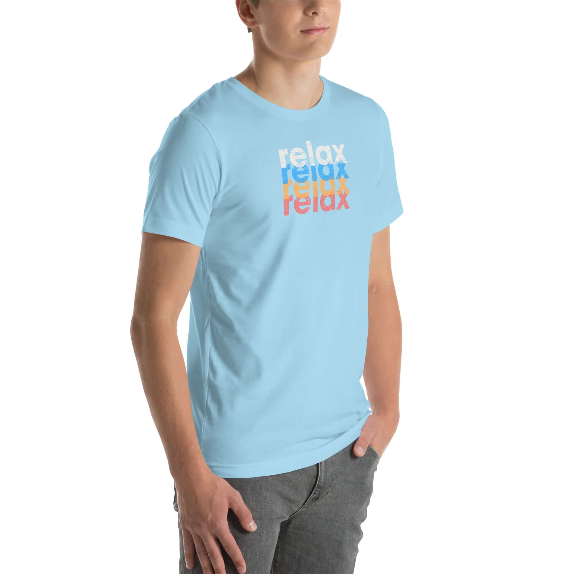Angled front view of a man wearing a Milk Sandwich ocean blue t-shirt with a colorful distressed relax text design repeated vertically in white, blue, orange, and pink.