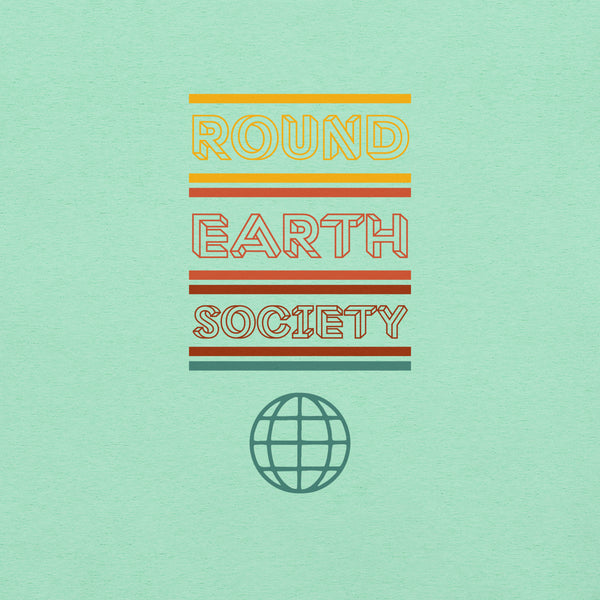 Close-up of a Milk Sandwich mint t-shirt featuring a colorful retro-style graphic with the words ROUND EARTH SOCIETY in yellow, orange, and red stripes above a teal globe icon.