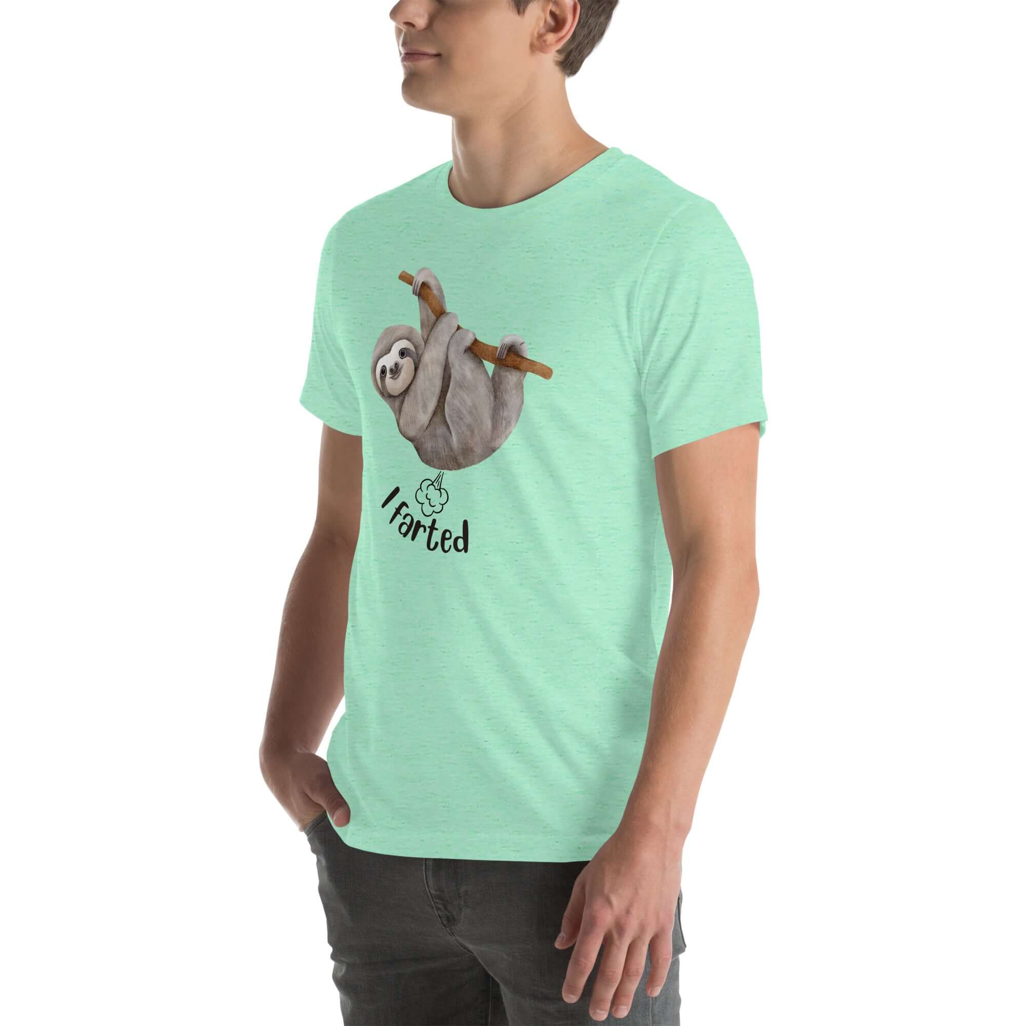 Man in a mint Milk Sandwich t-shirt with a humorous sloth illustration and the text I farted underneath, standing with one hand in his pocket.