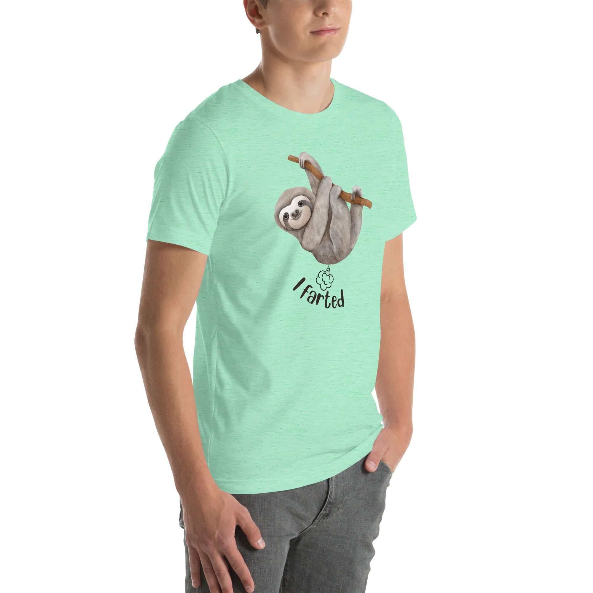 Side view of a man wearing a mint Milk Sandwich t-shirt featuring a playful cartoon sloth hanging from a branch with the phrase I farted and a small puff cloud illustration underneath.