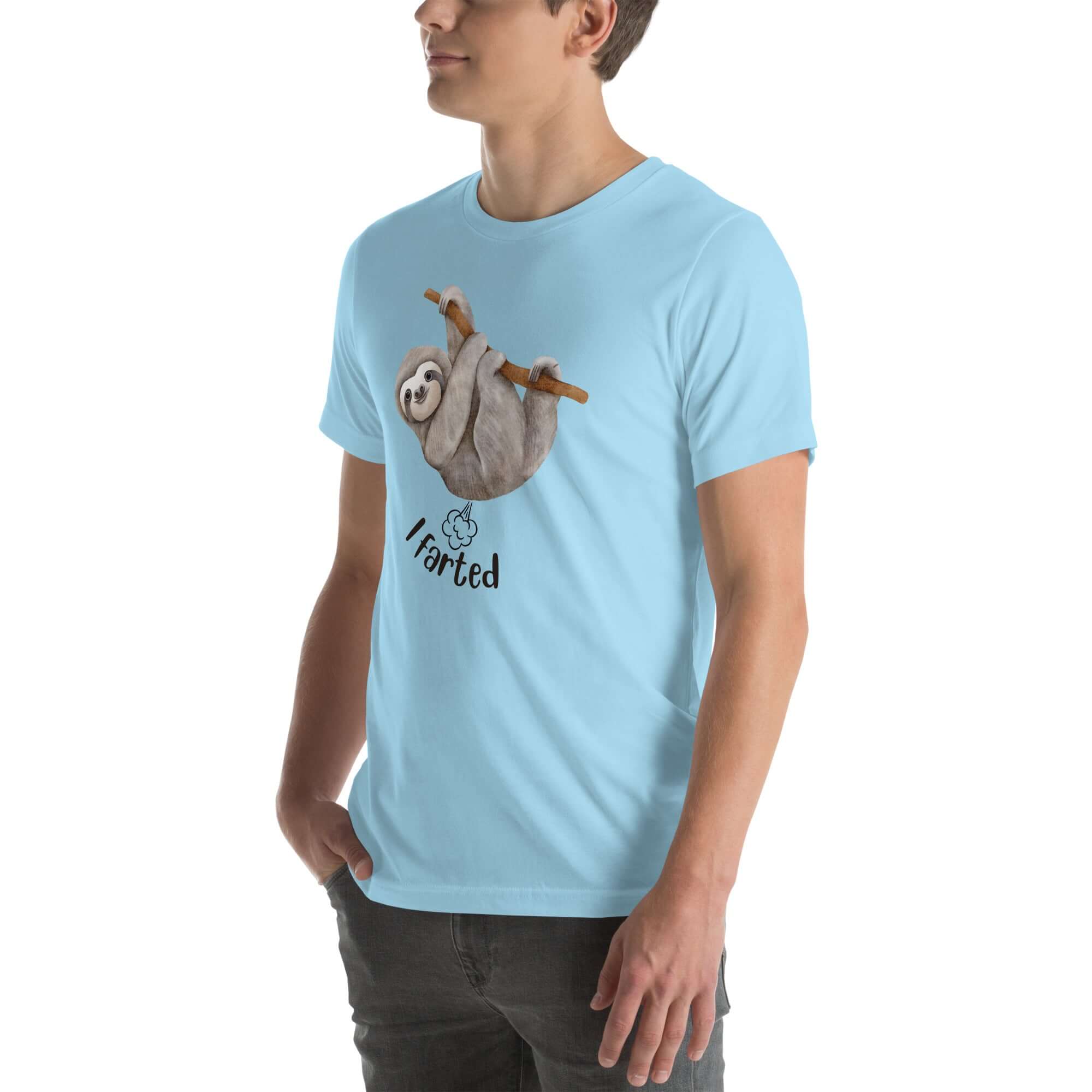 Man in a light blue Milk Sandwich t-shirt with a humorous sloth illustration and the text I farted underneath, standing with one hand in his pocket.