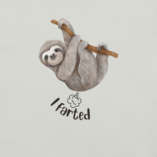 Close-up of a silver Milk Sandwich t-shirt with a cartoon sloth hanging from a branch and the humorous phrase I farted below a small illustrated puff cloud.