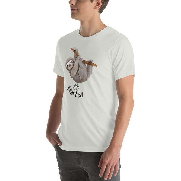 Silver in a mint Milk Sandwich t-shirt with a humorous sloth illustration and the text I farted underneath, standing with one hand in his pocket.