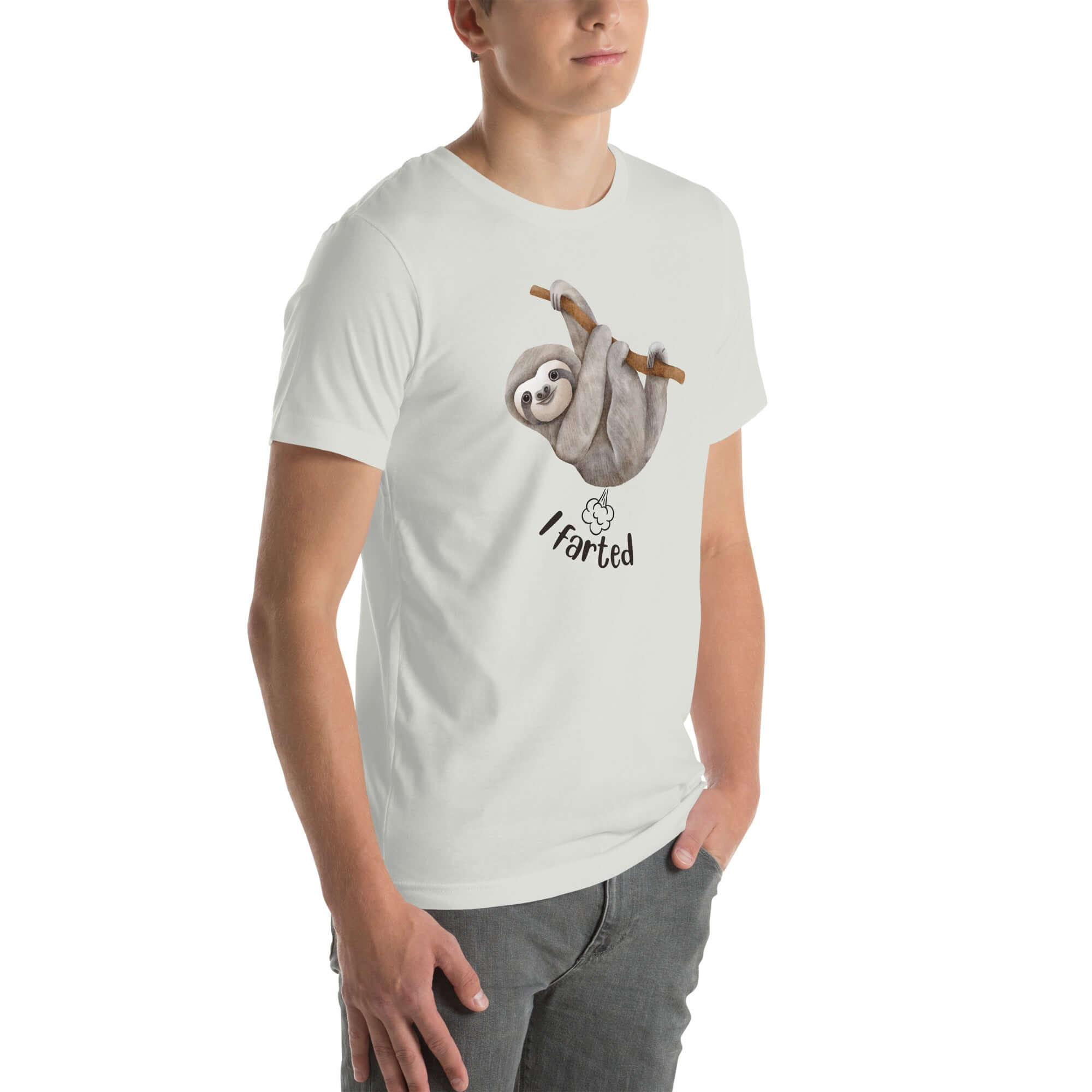 Side view of a man wearing a silver Milk Sandwich t-shirt featuring a playful cartoon sloth hanging from a branch with the phrase I farted and a small puff cloud illustration underneath.