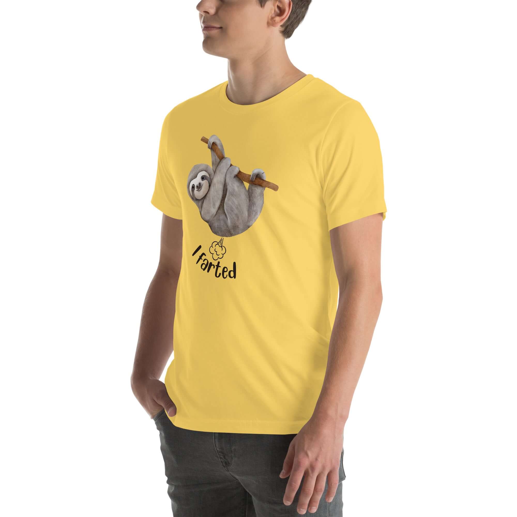 Yellow in a mint Milk Sandwich t-shirt with a humorous sloth illustration and the text I farted underneath, standing with one hand in his pocket.