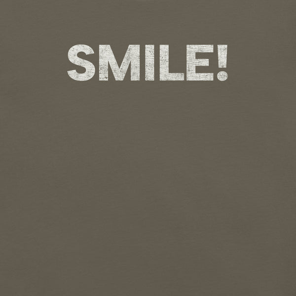 Close-up of army Milk Sandwich t-shirt with the word "SMILE!" printed in bold, distressed white text across the chest.