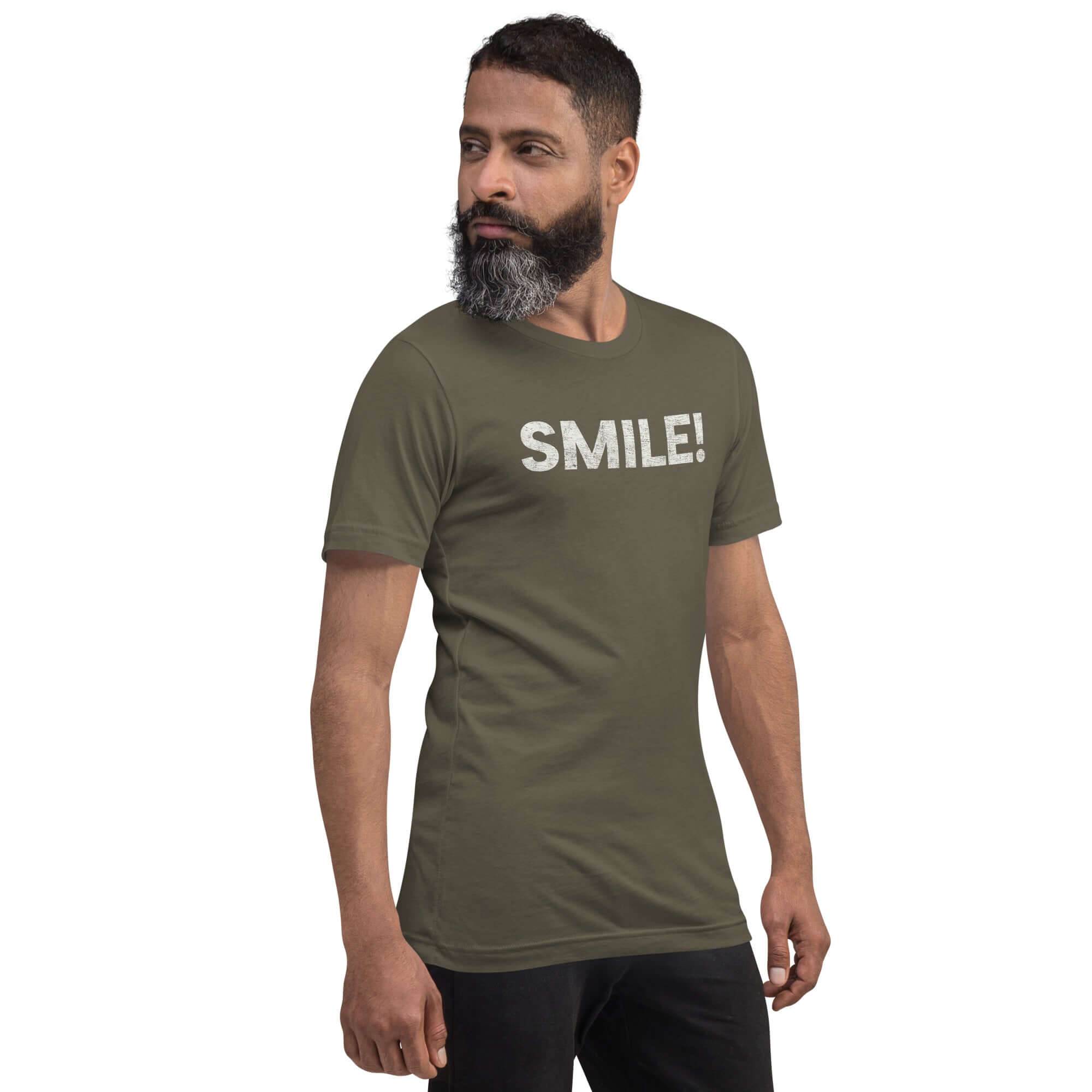 Side-facing man wearing army Milk Sandwich t-shirt with distressed white text that reads SMILE! on the chest, set against a white backdrop.