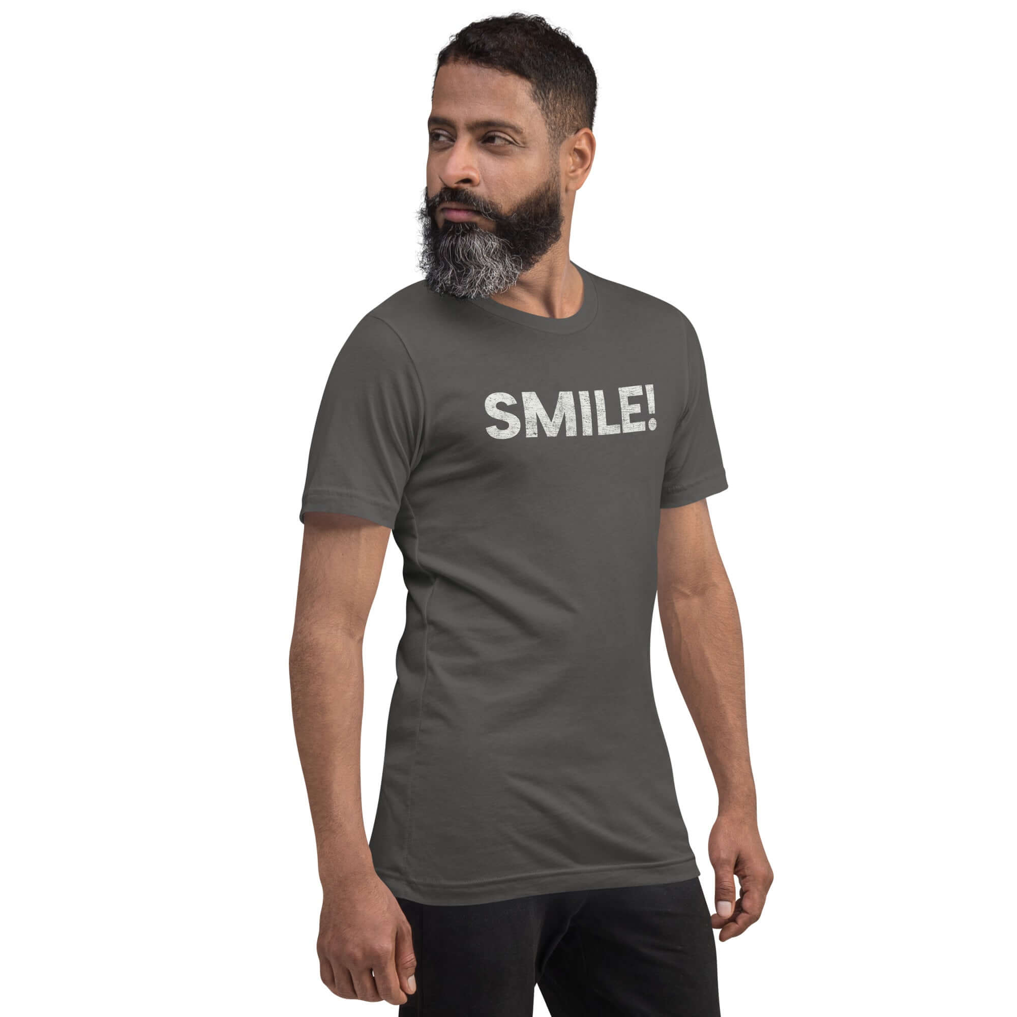 Side-facing man wearing asphalt Milk Sandwich t-shirt with distressed white text that reads SMILE! on the chest, set against a white backdrop.