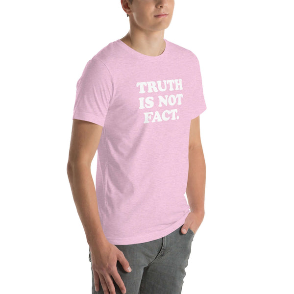 Unisex pink Milk Sandwich T-shirt with "TRUTH IS NOT FACT" slogan, showcasing soft, stretchy fabric and a flattering fit.