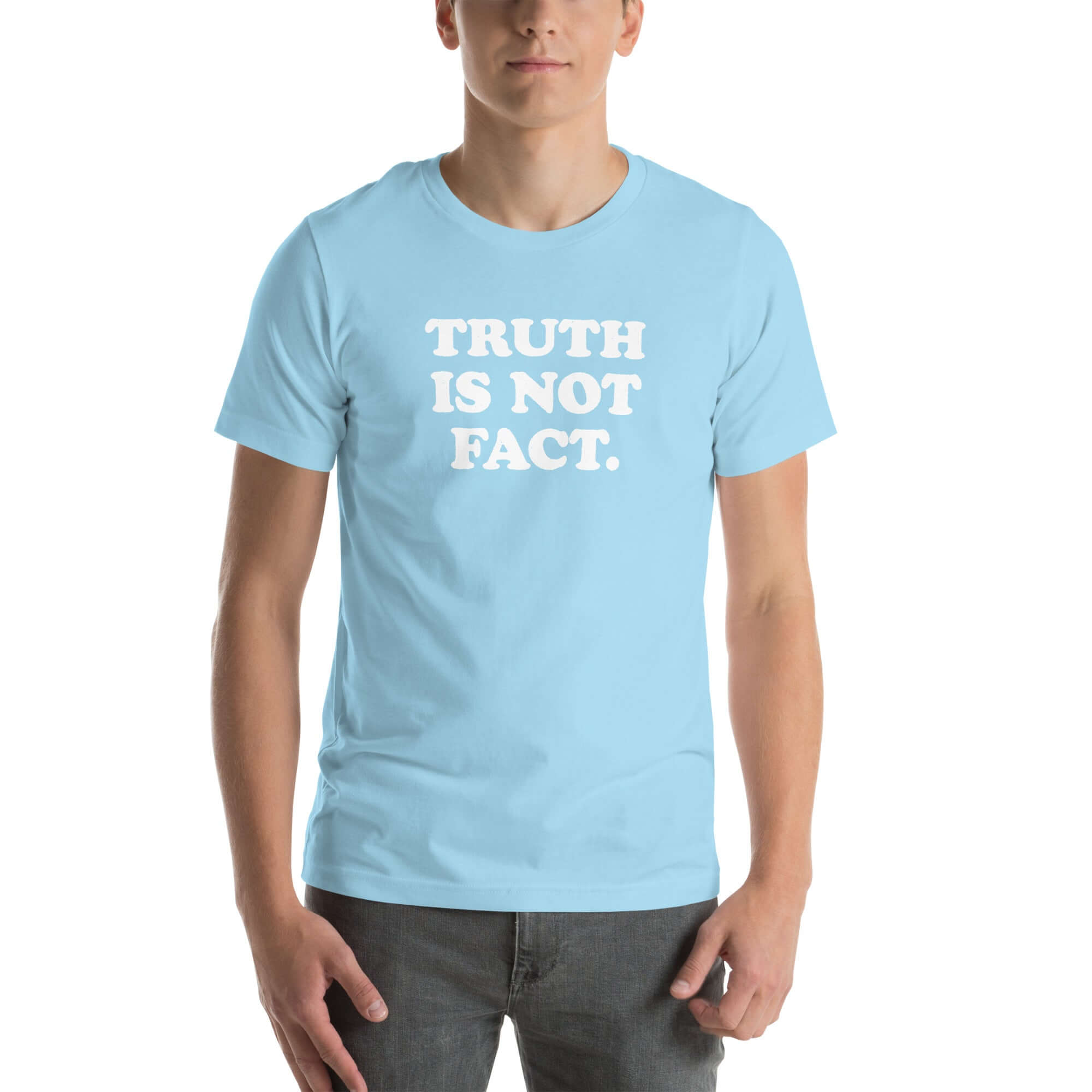 Light blue unisex Milk Sandwich T-shirt with the phrase "TRUTH IS NOT FACT" printed in bold white letters, showcasing comfort and style.
