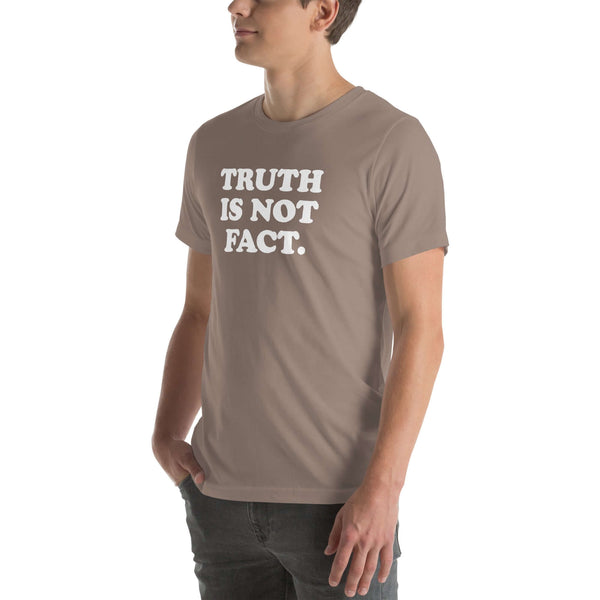 Unisex pebble Milk Sandwich T-shirt with the phrase "Truth is Not Fact" displayed prominently on the front.