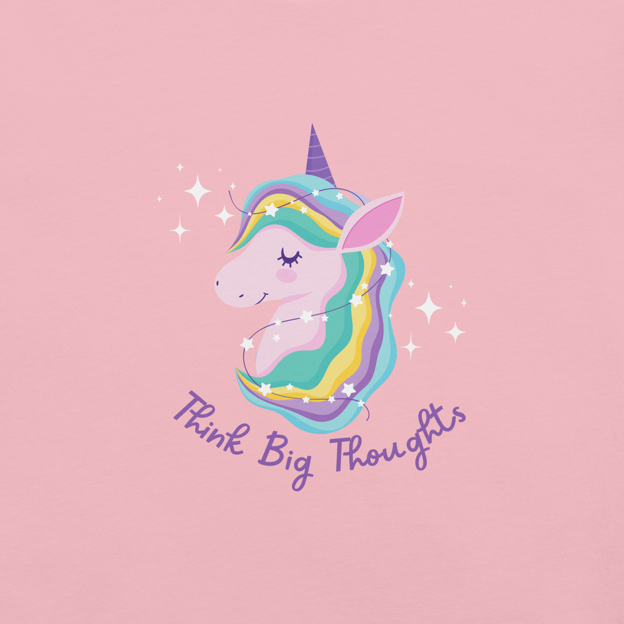 Close-up of a pink Milk Sandwich t-shirt with a pastel unicorn illustration and the phrase Think Big Thoughts in purple script, surrounded by sparkles.