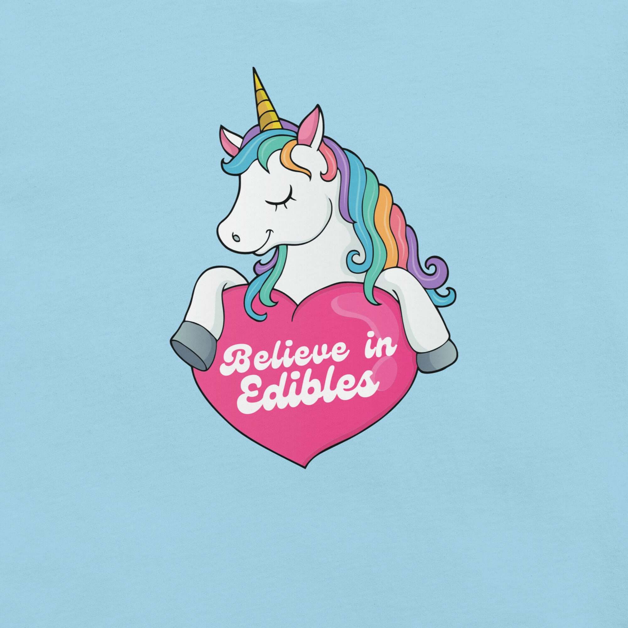 Ocean Blue of a colorful unicorn graphic holding a pink heart with the text “Believe in Edibles” on a light grey fabric background.