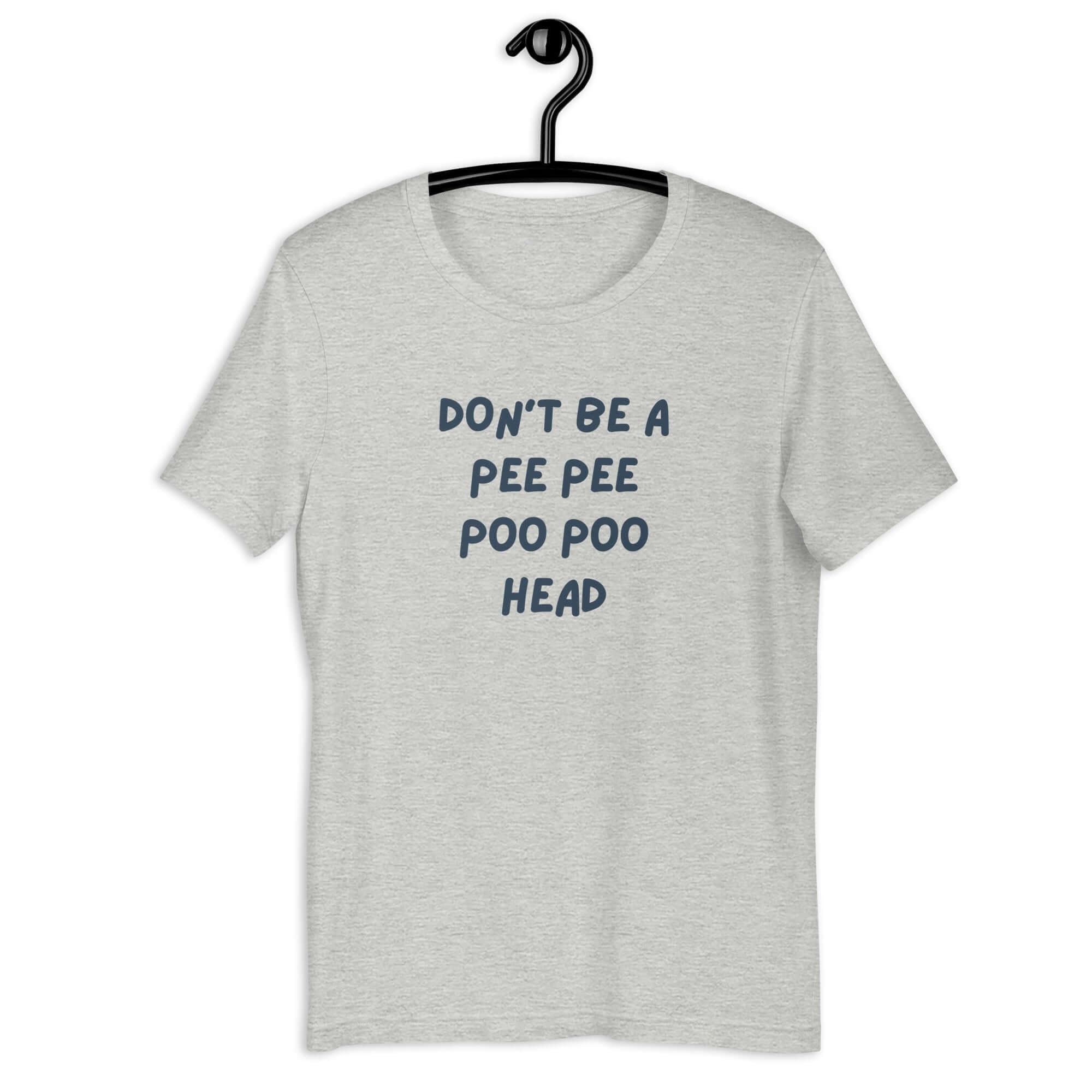 Light gret t-shirt on hanger with bold blue text: “DON’T BE A PEE PEE POO POO HEAD”.