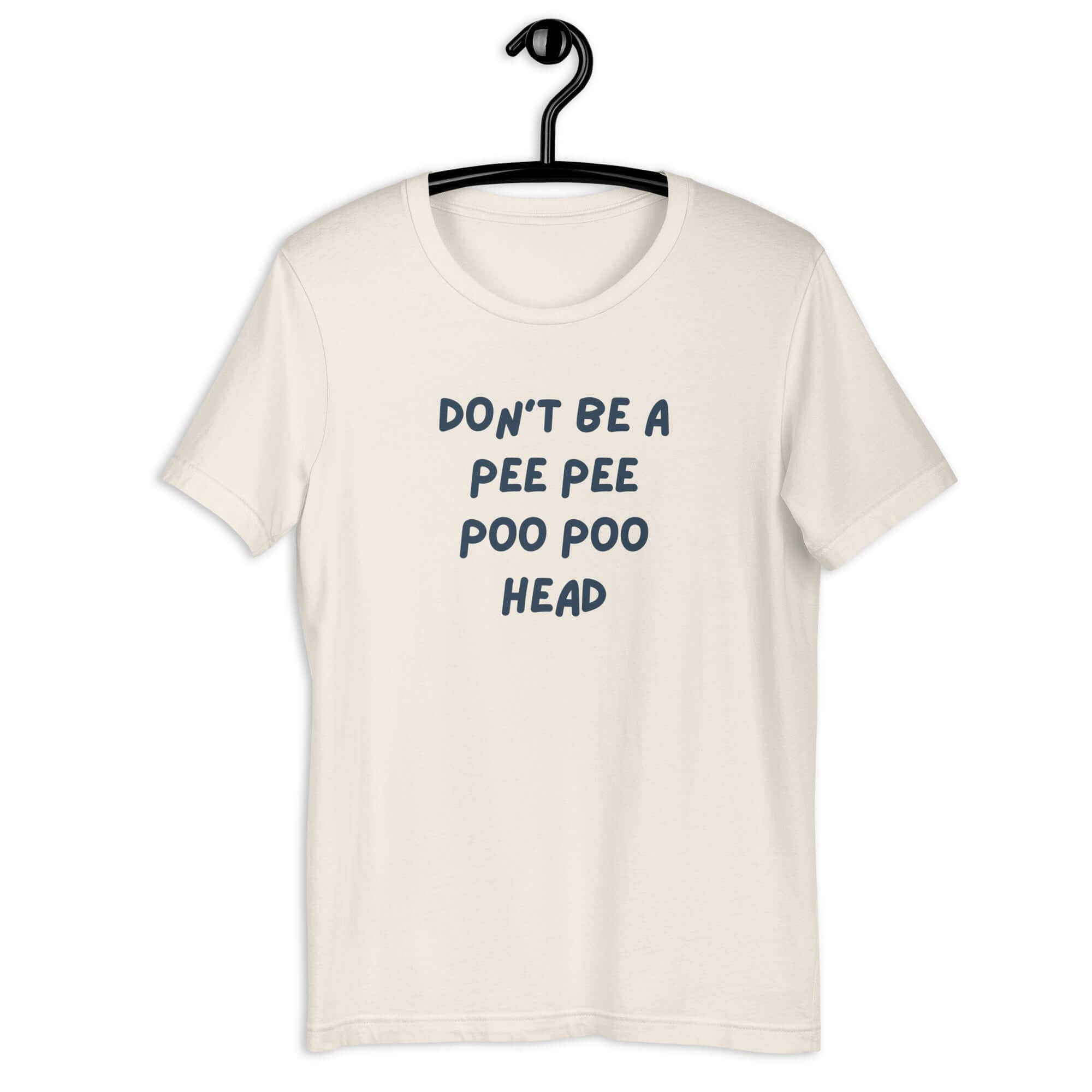 White t-shirt on hanger with bold blue text: “DON’T BE A PEE PEE POO POO HEAD”.