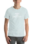 Man wearing a ice blue t-shirt with the text ‘HIGH ON CREATIVITY’ in bold white capital letters, centered on the chest